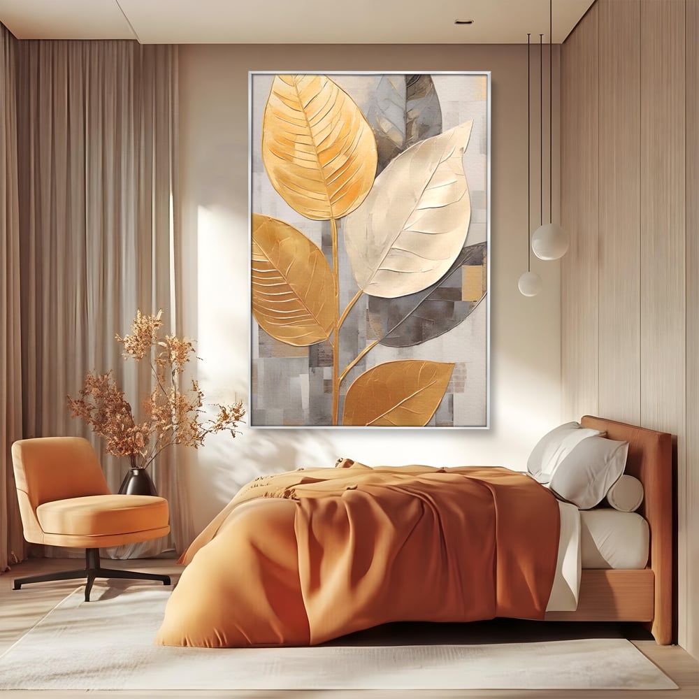 Tablou canvas cu tablou canvas cu frunze aurii texturate, in rama de aluminiu argintiu, pe perete intr-un dormitor